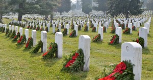 Group Accuses Non-Profit of 'Carpet-Bombing' National Cemeteries by Placing Wreaths across Veterans' Tombstones 