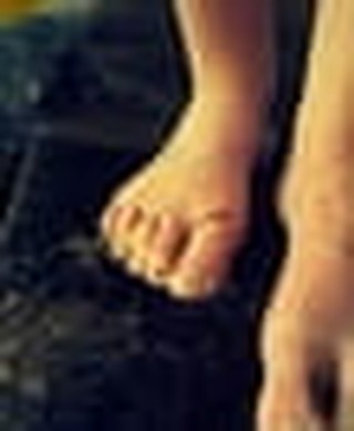 He Laid Hold of Their Feet