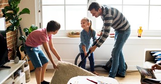 Family helping clean up