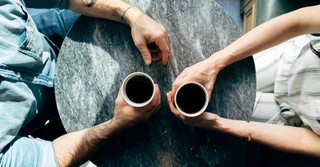 Friends talking over coffee