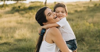 Mom and son hugging
