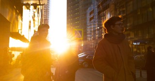 street scene people walking morning light