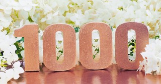 1000 glittered letters and white flowers