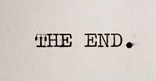 The End text on typewriter