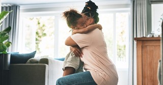 Mom comforting daughter