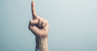 Pointing a finger to the sky