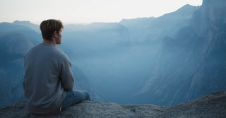 man looking at mountains, anxiety peace of christ