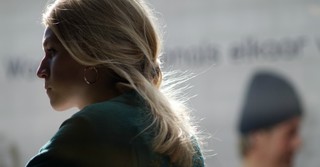 A young woman looking disappointed, angry