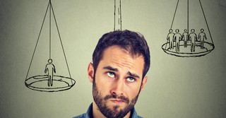 Man weighing the options