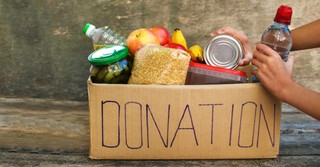 A donation box filled with food
