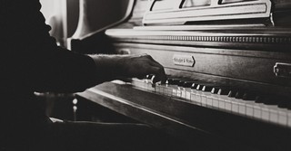 man playing piano