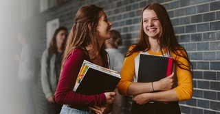 Two teenage girlfriends