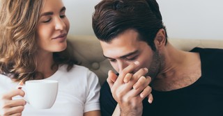 Husband kissing his wife's hand
