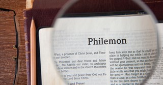 Bible opened to Philemon