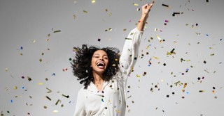 Woman throwing confetti