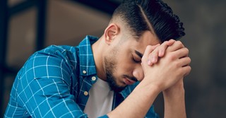 Young man praying