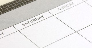 A close-up of a calendar, Saturday and Sunday blocks