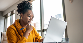 Woman working on a laptop