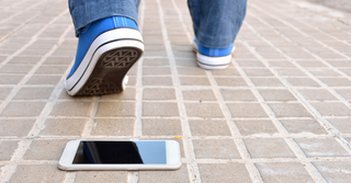 A man walking away from his phone