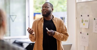 a man leading a group