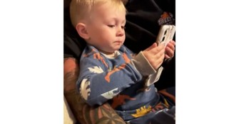 Toddler Tears up Looking at Pictures of His Parents