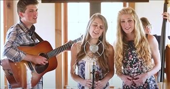 Family Bluegrass Bands Sings 'I Know Who Holds Tomorrow'