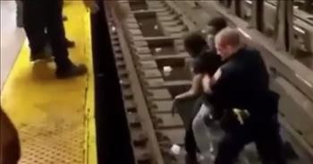 Officer And Strangers Save Unconscious Passenger On Subway Tracks