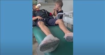 3-Year-Old Holds His Brother's Hand At The Dentist