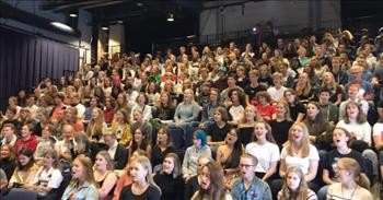 Auditorium Of Students Perform “Bohemian Rhapsody” Sing Along