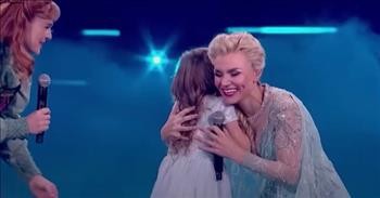 Ukrainian Girl Who Sang In Bomb Shelter Surprised by Real-Life Elsa