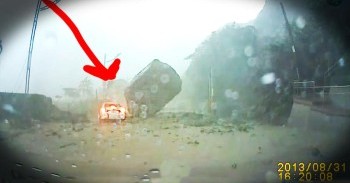 A Giant Boulder Nearly Crushes Car In Mudslide