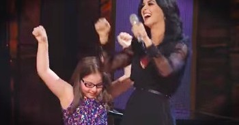 Beautiful Young Girl With Autism Performs With A Superstar