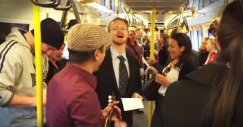 Stranger Starts ‘Somewhere Over The Rainbow’ Sing-A-Long On Train