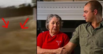 Woman Clings To Cross During South Carolina Floods