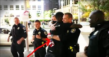 Man Spreads Joy And Love By Hugging Police Officers