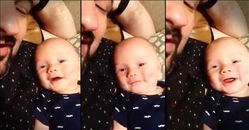 Dad Sings Hymn With Baby