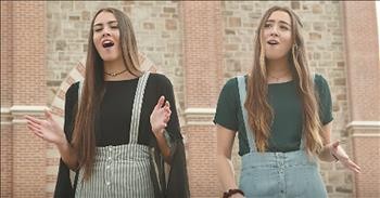2 Girls Stand In Field And Sing 'Be Thou My Vision'