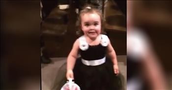 Flower Girl Stops In Aisle To Say Hi To Dad