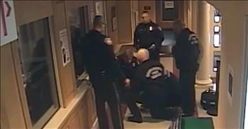 Police Officers Save Choking Puppy