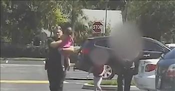 Dash Cam Shows Police Officer Saving Girl From Hot Car