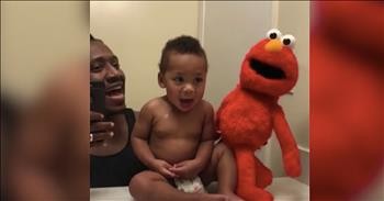 Dad Entertains Baby With Spot-On Elmo Impersonation