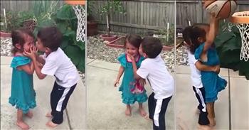 Brother Comforts His Sister After She's Hit With A Basketball