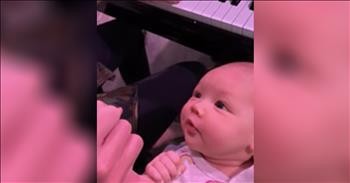Couple Sings 'I Want To Hold Your Hand' To Infant Baby