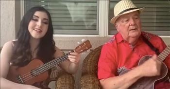 Grandfather And Granddaughter Sing Ukulele Duet Of 'That's Amore'