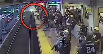 Worker Saves Passenger Who Falls Onto Track Seconds Before Train Arrives
