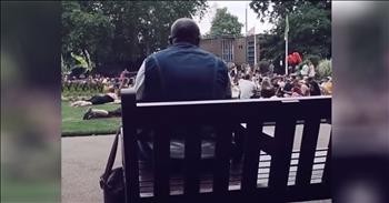 Man On Park Bench Starts Singing 'Livin' On A Prayer' Then Everyone Joins In