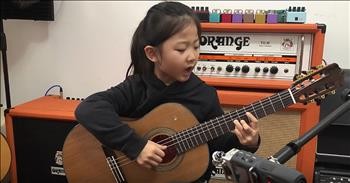 6-Year-Old Guitarist Performs 'Fly Me To The Moon'
