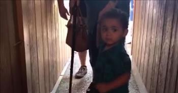 Sweet Toddler Gives Grandma A Helping Hand Down The Hallway