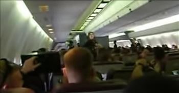 Marines Serenade Flight Attendant With 'Sweet Caroline' On Plane Ride Home
