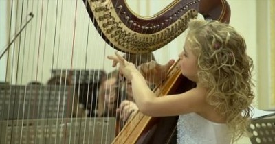 When You Hear this Angel Playing a Harp, You'll Think You've Gone to Heaven 